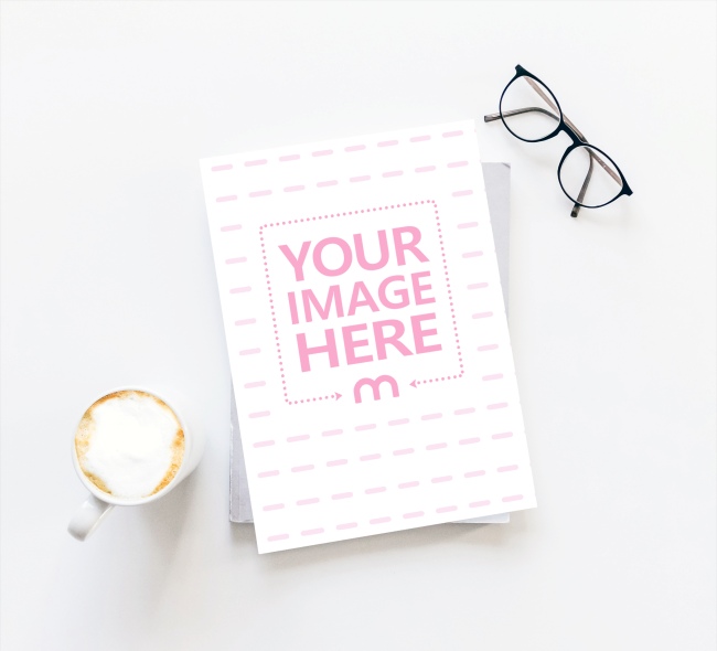 Portrait Card on Table with Coffee and Glasses Mockup Generator preview image